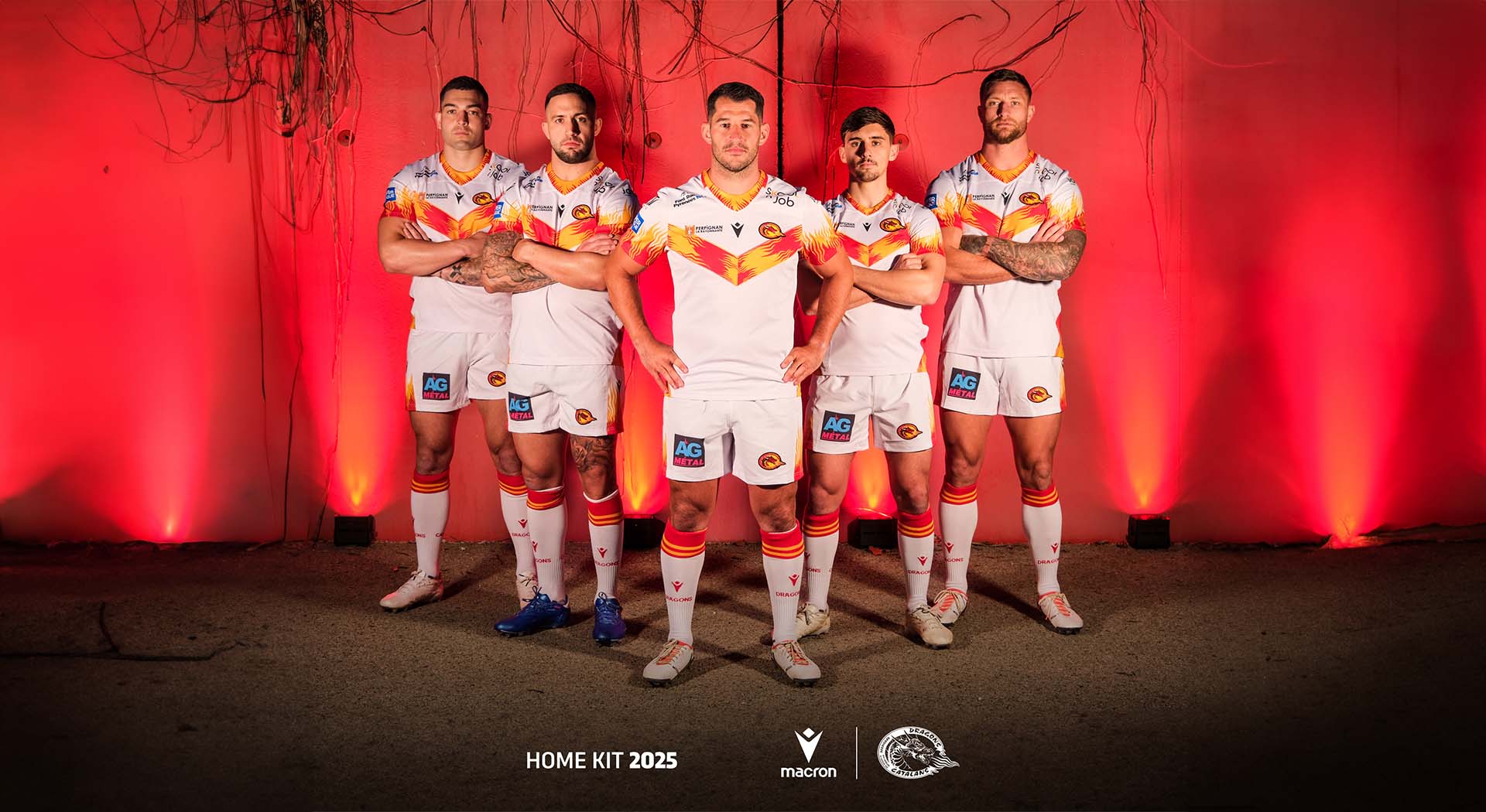 The flames of the dragon decorate Macron’s new Home Kit for Dragons Catalans